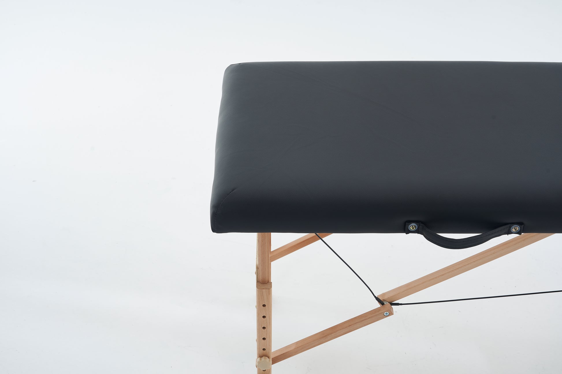 portable wooden massage table end