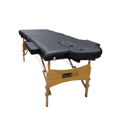 BeautéSync® Portable Wooden Massage Table – 73"x28", Black PVC Leather, with Armrests, Headrest, Sling, Pillow & Carry Bag