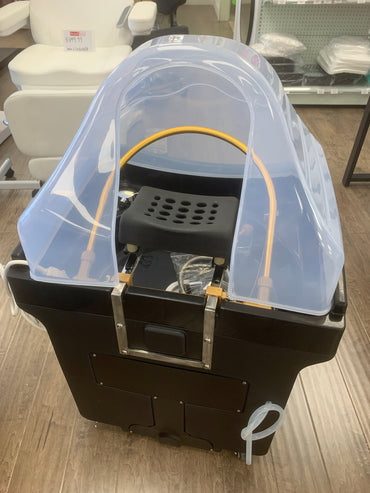 BeautéSync® Mobile Head Spa Capsule showroom real shot – portable head spa station with steam hood displayed in salon demo room