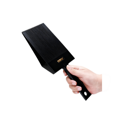 BeautéSync® Professional Flat Top Hair Cut Comb handheld view by barber, demonstrating ergonomic grip and lightweight design