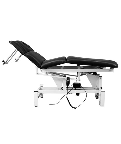 Close-up of electric height adjustment pedal on Everest massage bed