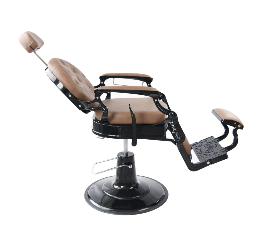 Barber chair with high-density foam, hydraulic pump, and steel frame reclined.