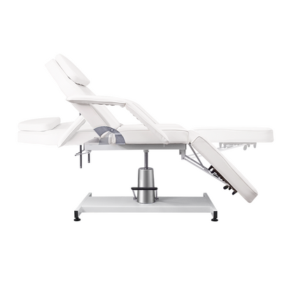 white tattoo spa bed with ergonomic design and manual adjustments