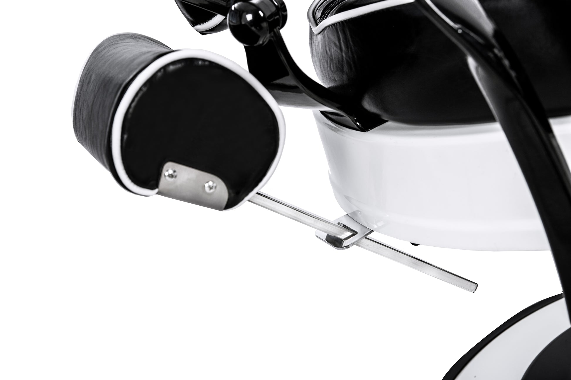 black and white barber chair headrest stored