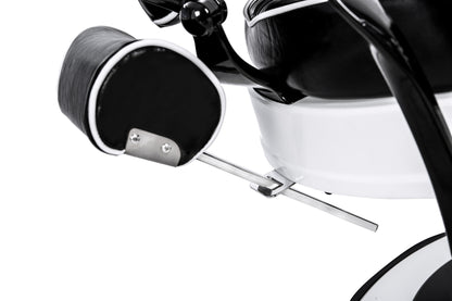black and white barber chair headrest stored